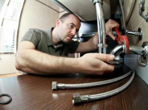 Piedmont CA plumbing contractor repairs a sink P trap